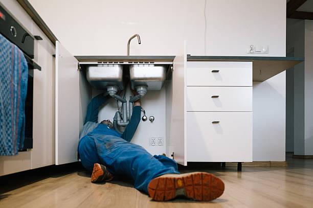 Professional Emergency Plumber technician working in Westville, FL